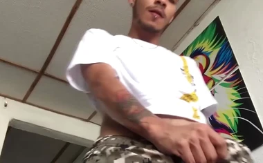 Tattooed Latino amateur Juan jerks off his big dick and cums